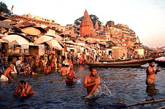 PILGRIMS TAKING BATH IN HOLY GANGA RIVER