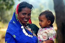 AN ADIVASI WOMAN  AND   CHILD